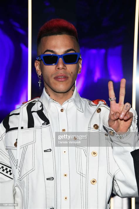 Sfera Ebbasta attends the Versace show during Milan Menswear 